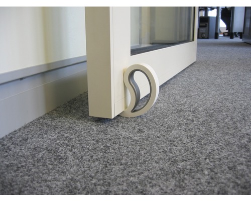 Butoir de porte pour fixer une porte sur une moquette