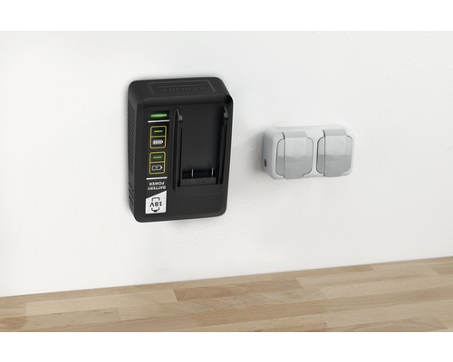 Chargeur rapide de batterie Kärcher monté sur un mur