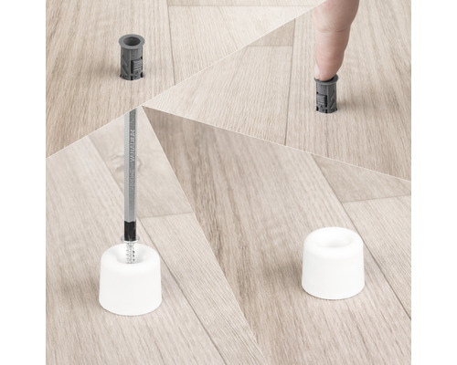 Montage d''un butoir de porte sur un plancher en bois avec des vis et des chevilles