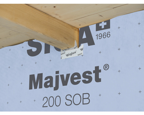 Parement de façade Siga Majvest 200 SOB sous une poutre en bois