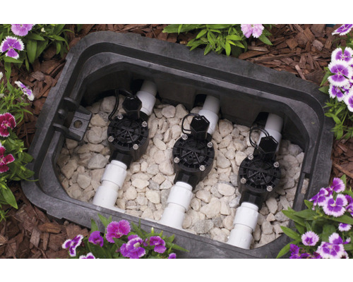 Distributeur de vannes pour l''arrosage de jardin dans un boîtier souterrain