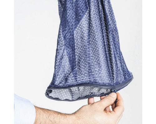 Sac en filet avec fermeture éclair dans la main