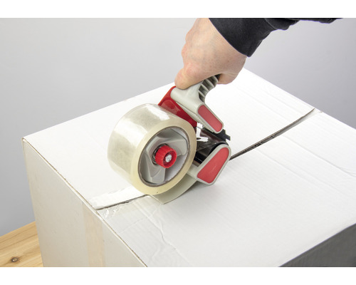 Carton scellé avec un dérouleur de ruban adhésif d''emballage