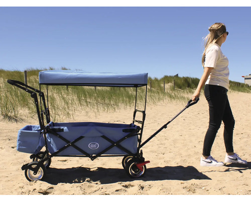 Chariot à bras avec toit et barre de traction sur sable