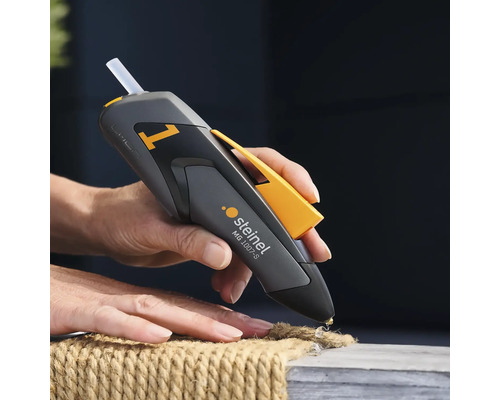 Pistolet à colle chaude Steinel MG 1007-S en utilisation sur une corde