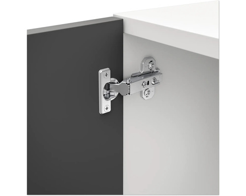 Charnière sur une porte de meuble ou d''armoire