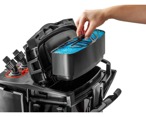 Filtre externe d''aquarium avec masses filtrantes et main