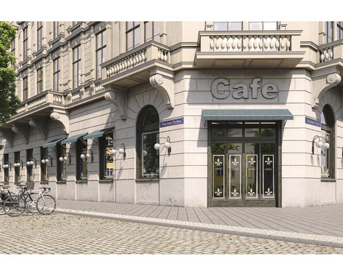 Aussenansicht eines Cafés in einem Gebäude im klassischen Stil mit Fahrrädern