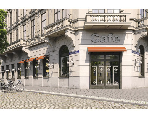 Vue extérieure d''un café avec des stores et des vélos devant le bâtiment.