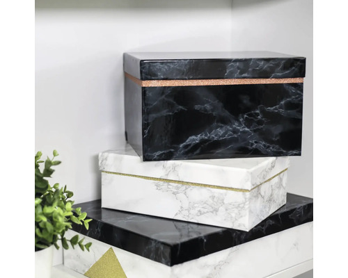 Pile de boîtes de rangement décoratives à motif marbré