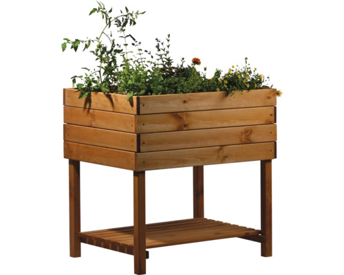 Jardinière sur pieds en bois avec des plantations