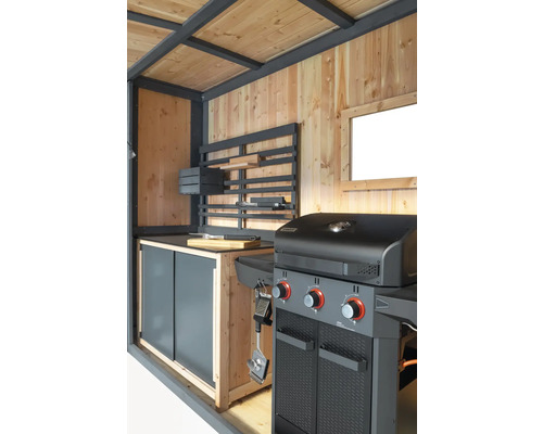 Cuisine d''extérieur avec barbecue à gaz, plan de travail et espace de rangement