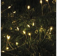 Gros plan d''une guirlande lumineuse avec des lampes LED et des boules décoratives fixée à un arbre de Noël.