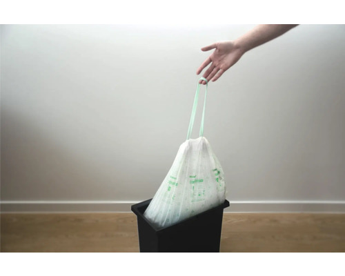 Sac à déchets organiques avec poignée dans une poubelle