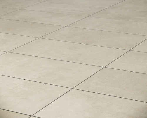 Sol carrelé avec carreaux carrés et joints