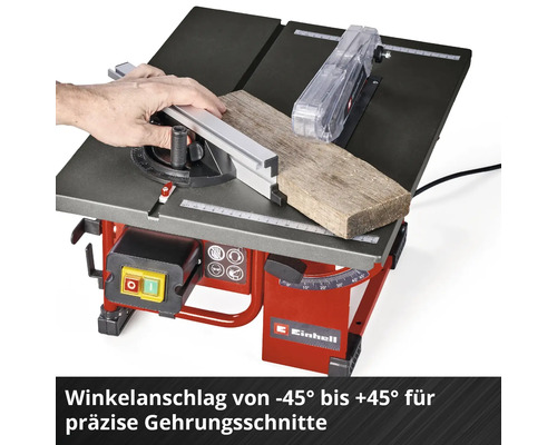 Scie circulaire de table Einhell coupant une pièce de bois