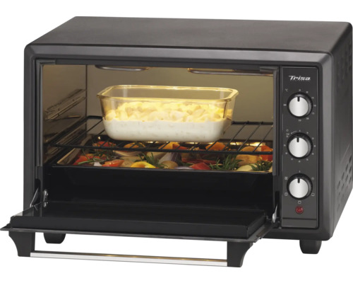 Mini-four Trisa avec des aliments dans le compartiment de cuisson