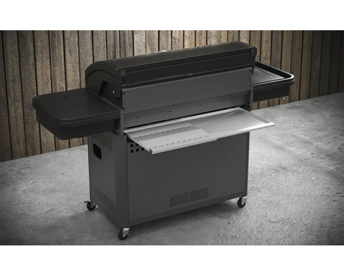 Barbecue avec tablette latérale et meuble bas sur roulettes