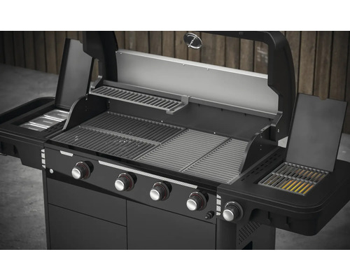 Barbecue à gaz ouvert avec quatre brûleurs et une grille de maintien au chaud.