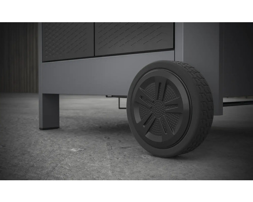 Gros plan sur une armoire d''atelier grise avec roue