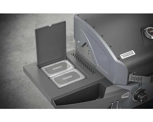 Barbecue Tenneker avec compartiment latéral ouvert et deux récipients