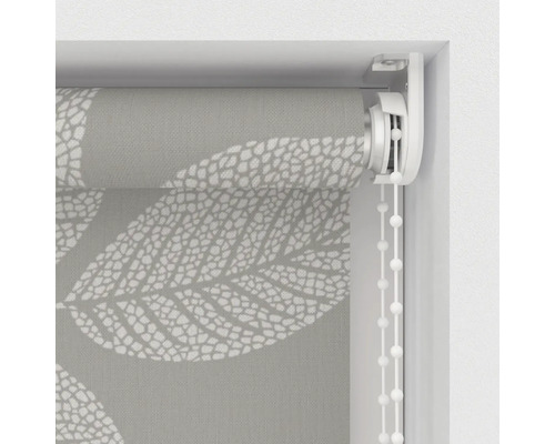 Gros plan d''un store enrouleur avec motif de feuilles et chaînette