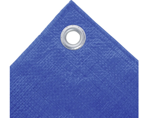 Gros plan d''une bâche tissée bleue avec oeillet