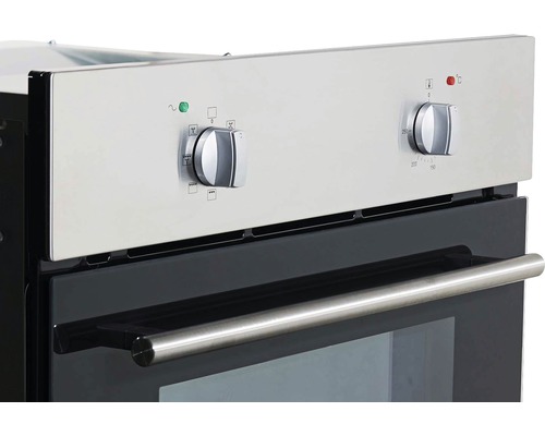 Vue détaillée d''un four avec boutons de commande