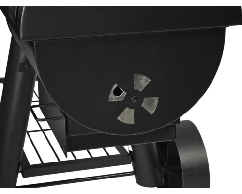 Detailansicht eines Holzkohlegrills mit Luftzufuhrregelung