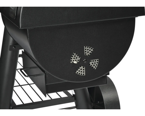 Detailansicht eines schwarzen Pelletgrills mit Lüftung