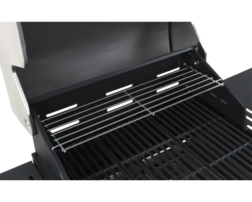 Detailansicht des Innenraums eines Grillwagens mit Grillrost und Warmhalterost