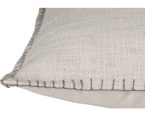 Coussin décoratif avec surface structurée et point décoratif