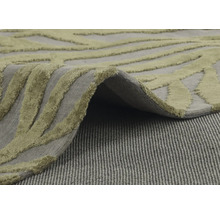 Vue détaillée d''un tapis avec motif abstrait et design à poils longs