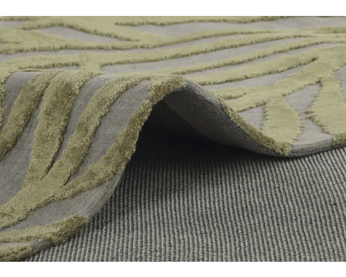 Vue détaillée d''un tapis avec motif abstrait et design à poils longs