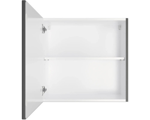 Vue intérieure d''une armoire de salle de bains ouverte avec une étagère