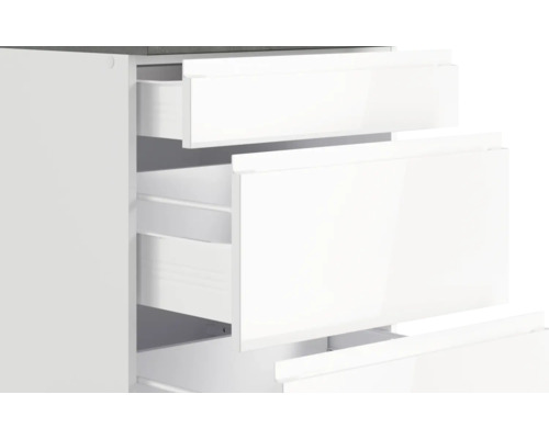 Meuble à tiroirs blanc avec tiroirs ouverts