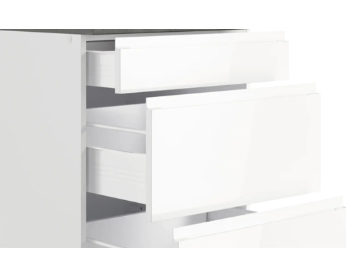 Meuble bas blanc avec tiroirs ouverts pour salle de bain ou cuisine