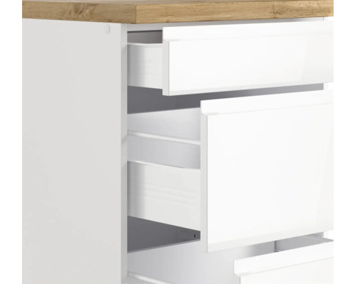 Vue détaillée d''une commode blanche avec des tiroirs et un plateau en bois