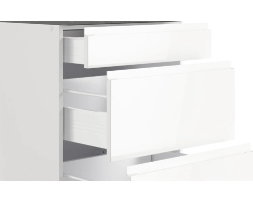 Meuble de salle de bain blanc avec tiroirs ouverts pour ranger les articles de toilette.