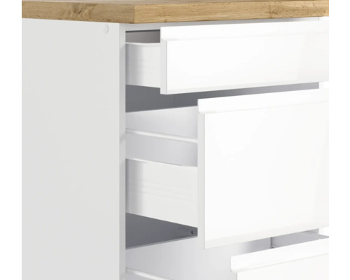 Commode avec tiroirs ouverts blancs et plateau en bois