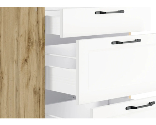 Vue détaillée d''une armoire avec des tiroirs blancs et une structure en bois