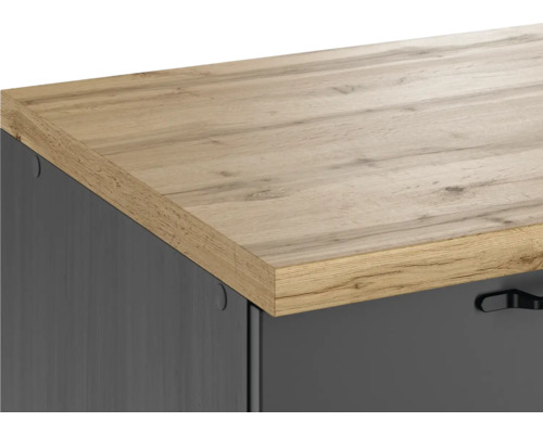 Gros plan d''un meuble avec plateau en bois et tiroirs