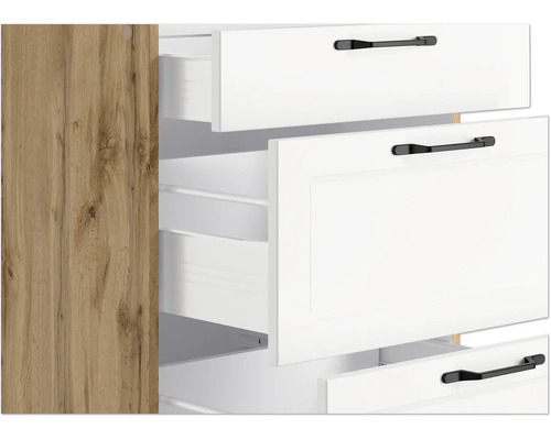 Vue détaillée d''une armoire avec des tiroirs ouverts et un décor en bois sur le côté.