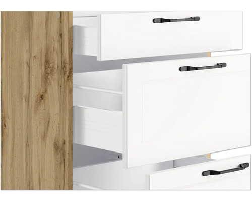 Armoire avec tiroirs blancs ouverts et poignées noires