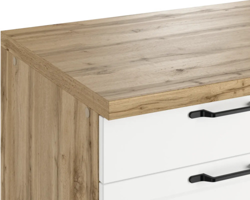 Gros plan d''un meuble commode avec des tiroirs et une surface en bois