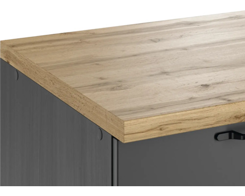 Gros plan d''un meuble avec plateau en bois et façade sombre