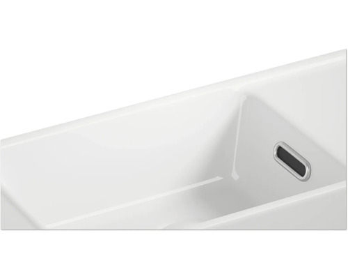 Vue détaillée d''un lavabo en céramique avec trop-plein