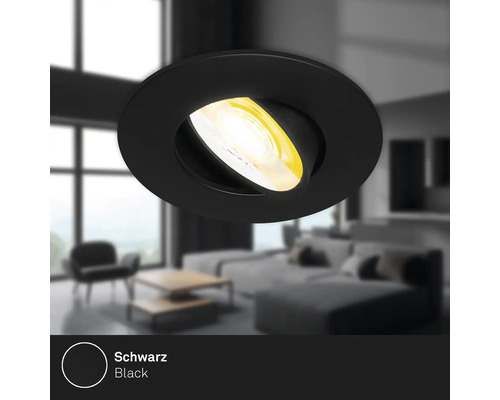 Schwarzer Deckeneinbaustrahler im Wohnzimmer