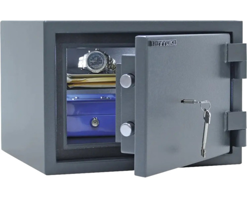 Geöffneter grauer Geldschrank mit Schlüssel und Inhalt