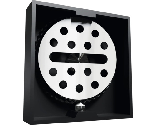 Appareil de ventilation avec cache rond perforé dans un boîtier noir